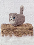 Handmade loaf cat crochet plushie with a rounded bread-loaf shape