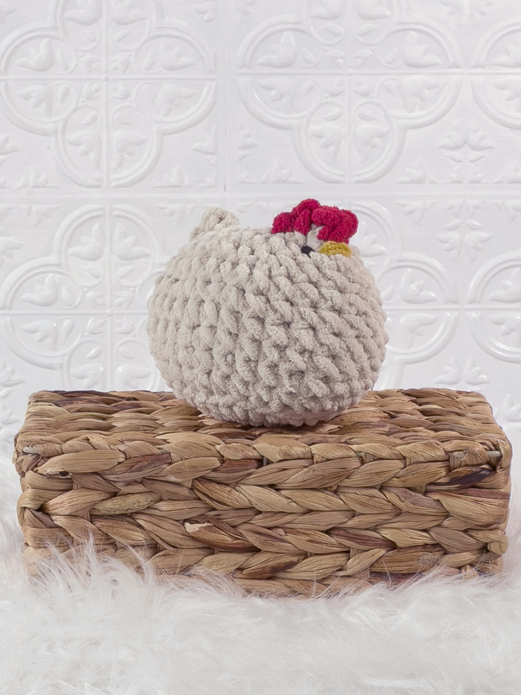 Handmade beige chicken crochet plushie shown from an angled view