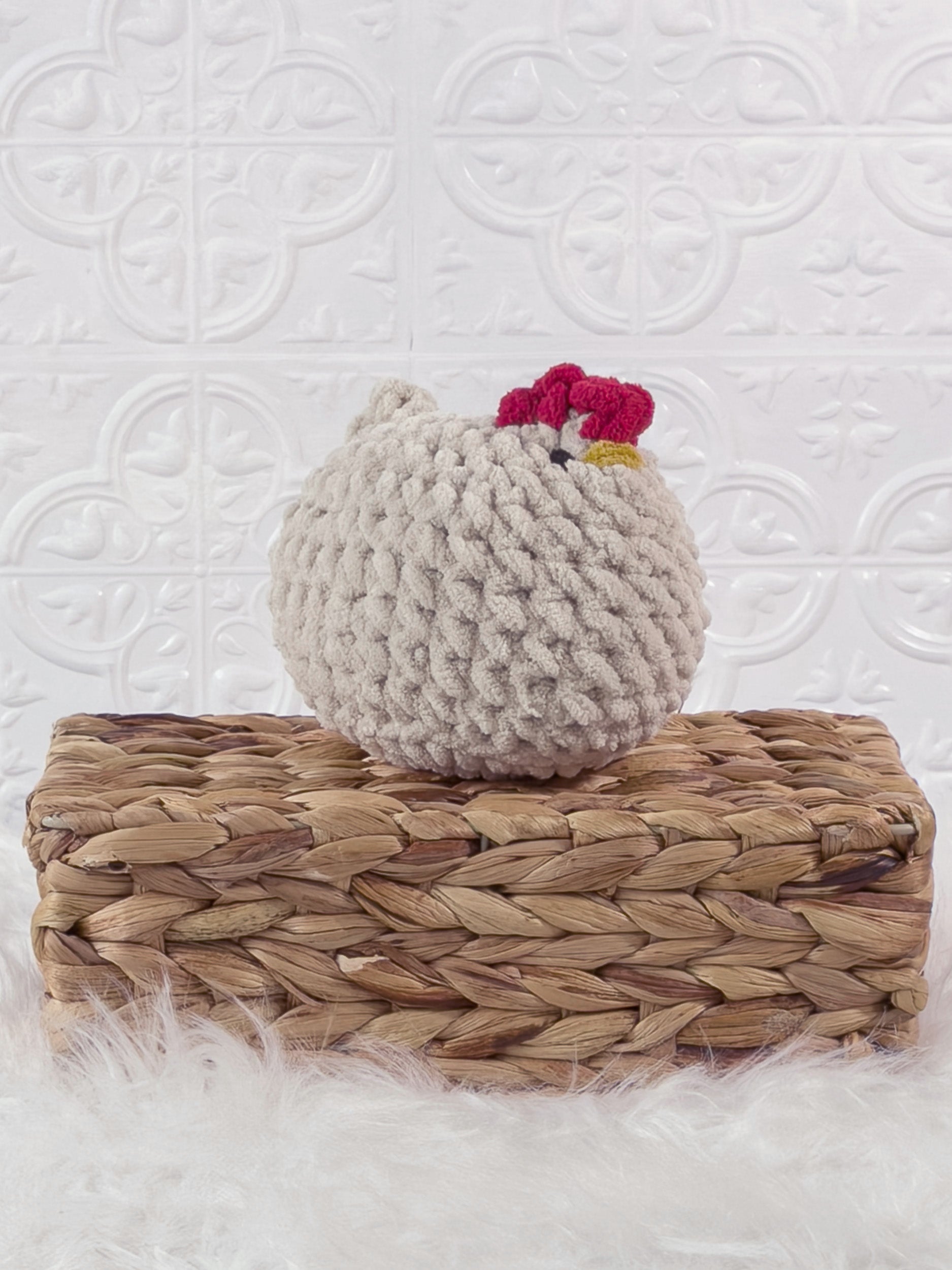 Handmade beige chicken crochet plushie shown from an angled view