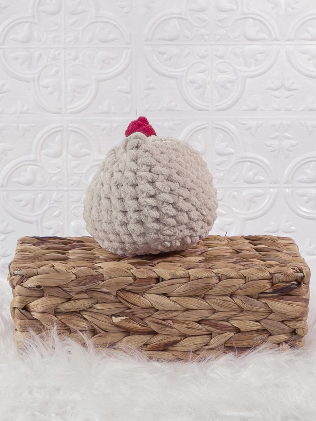 Handmade beige chicken crochet plushie shown from the back