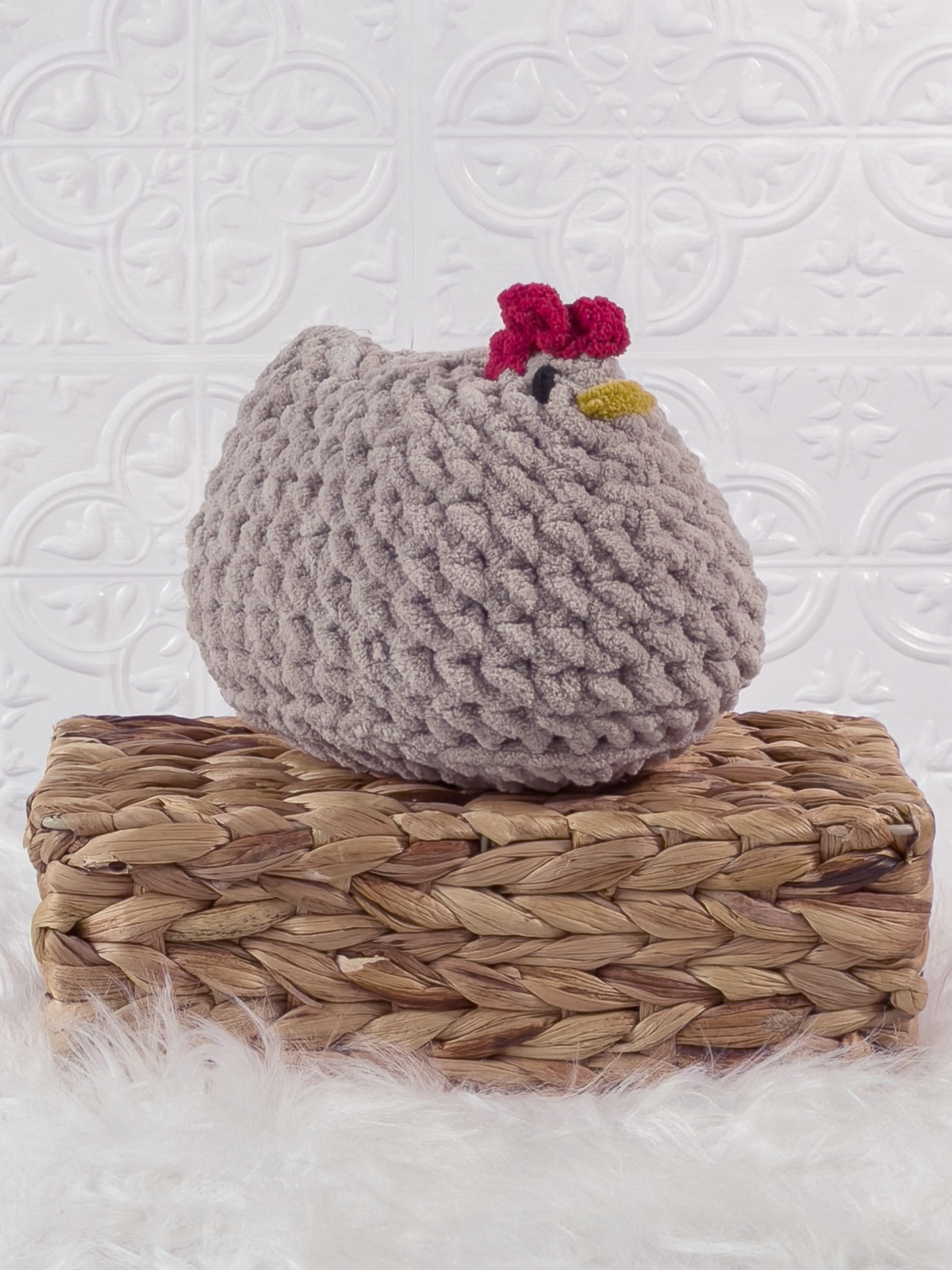 Handmade beige chicken crochet plushie shown from an angled view