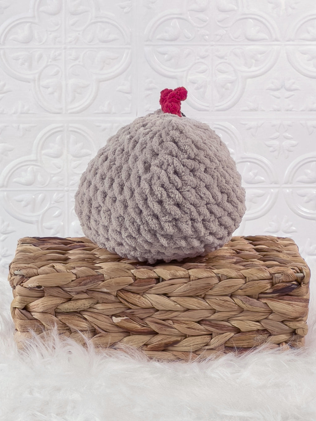 Handmade beige chicken crochet plushie shown from the back