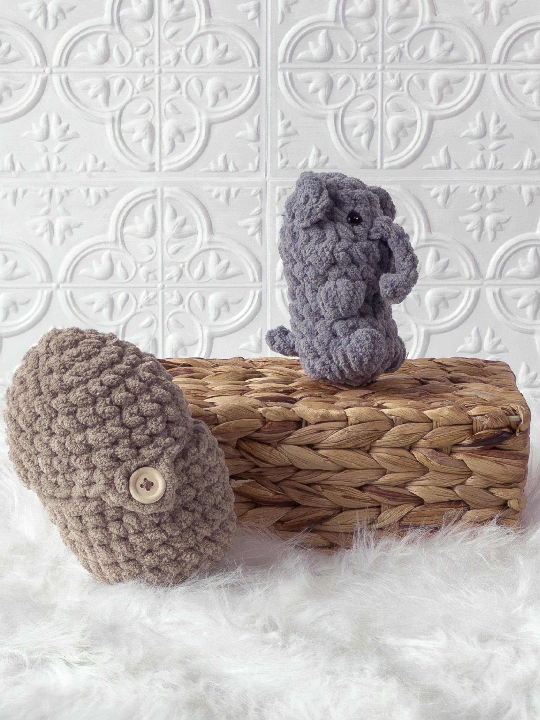 Handmade beige, grey peek a boo elephant in peanut crochet plushie shown from an angled view