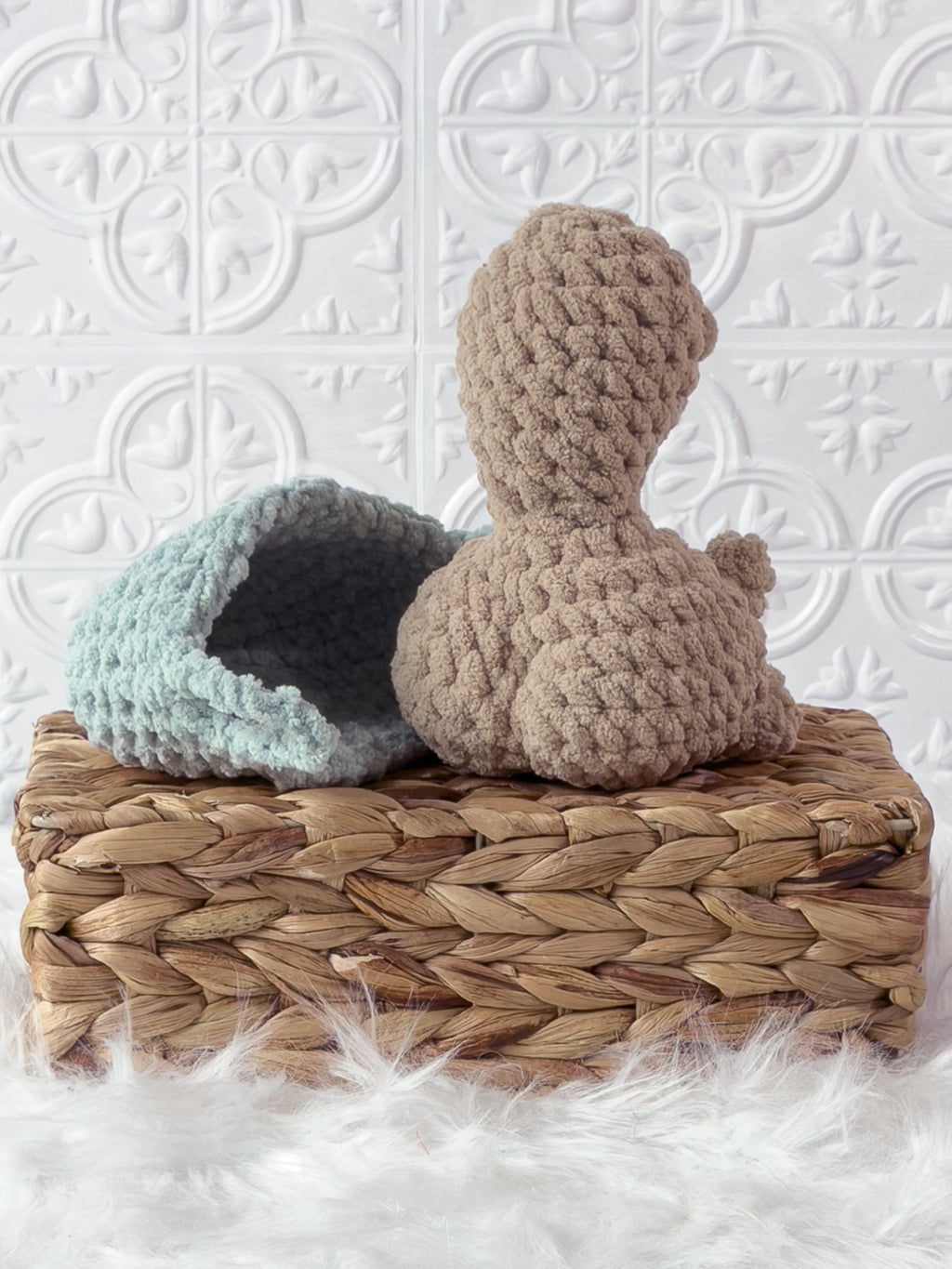 Handmade beige, light turtle crochet plushie shown from the back