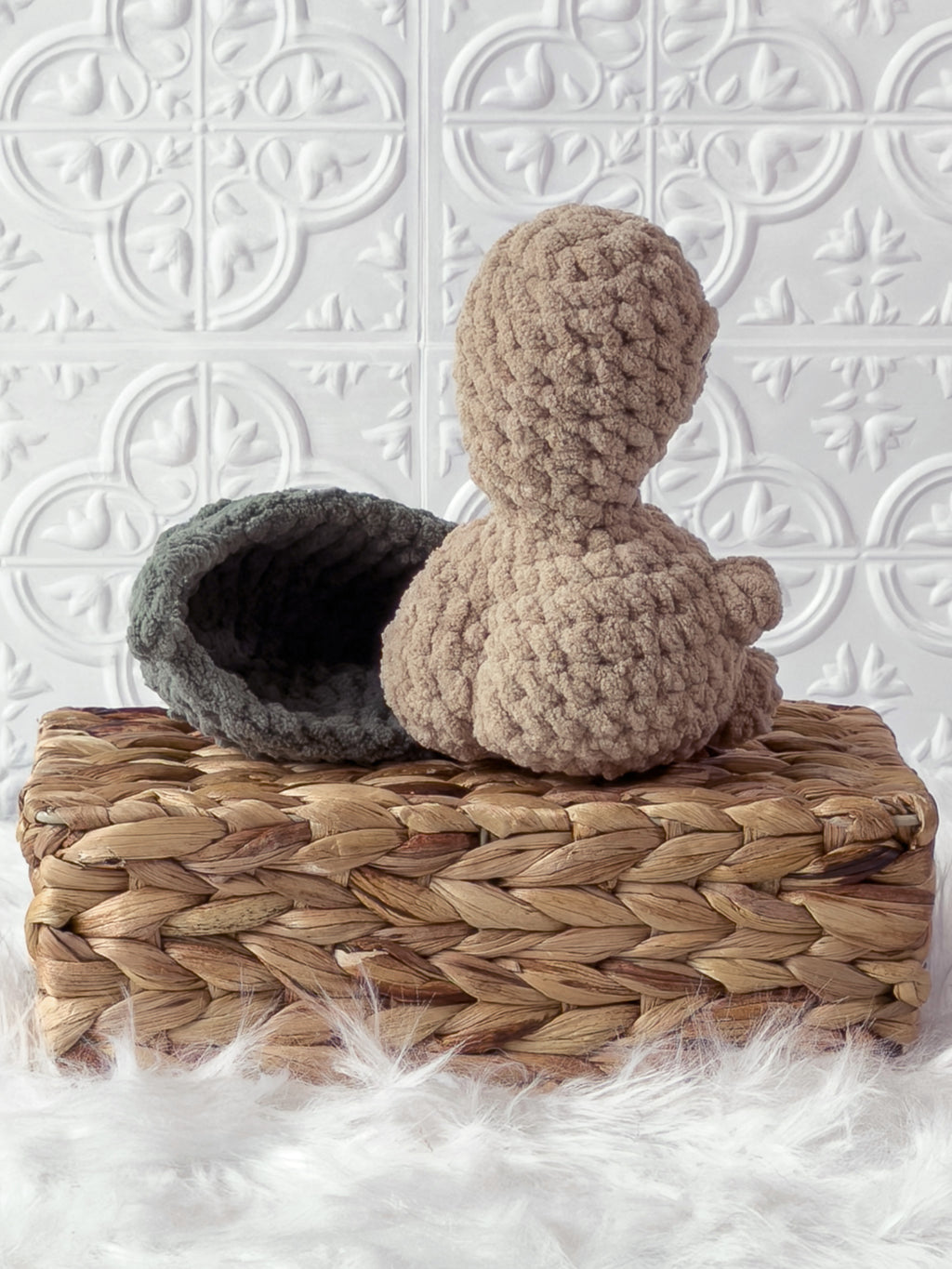 Handmade beige, medium turtle crochet plushie shown from the back