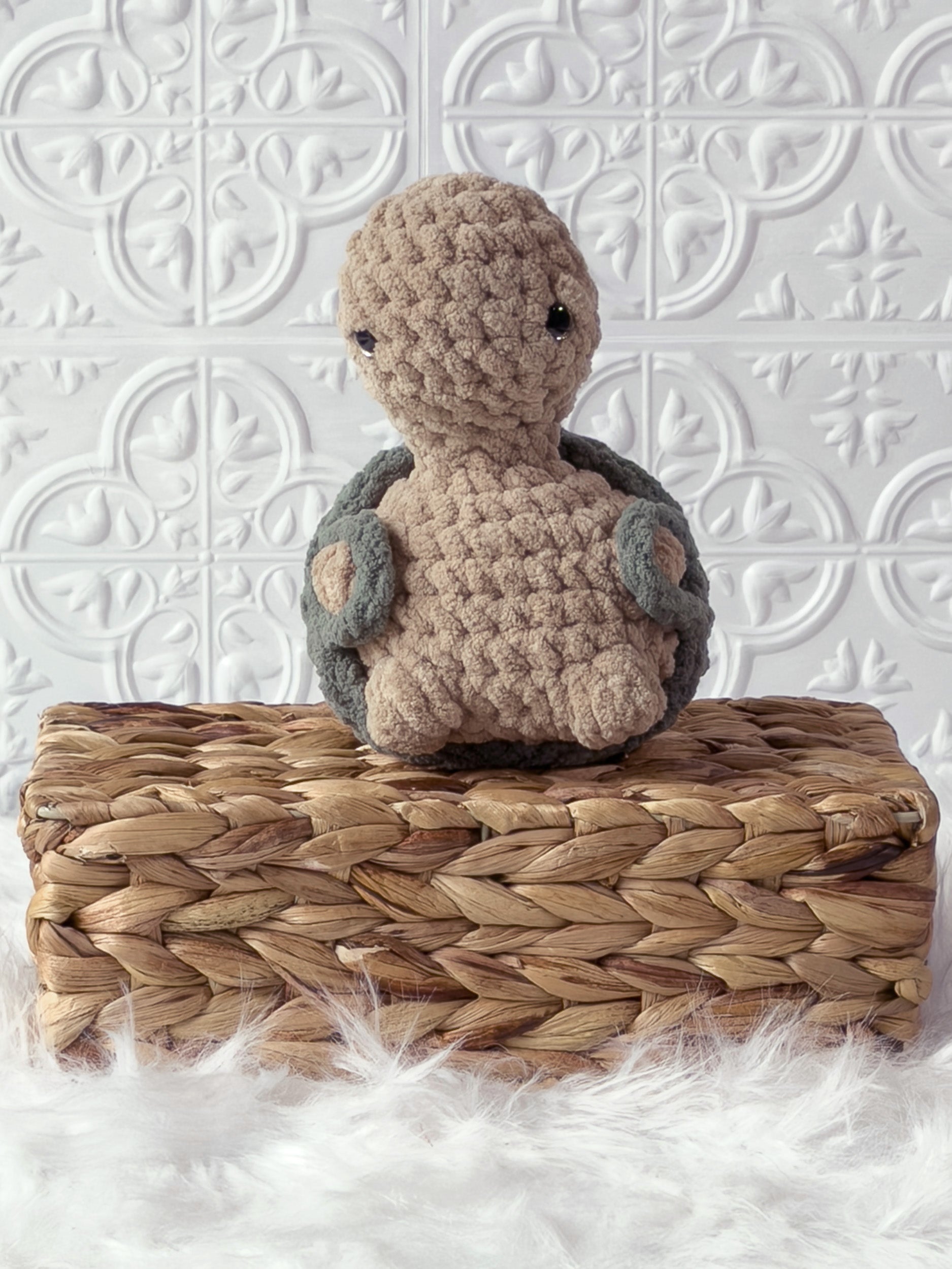 Handmade beige, medium turtle crochet plushie shown from the front