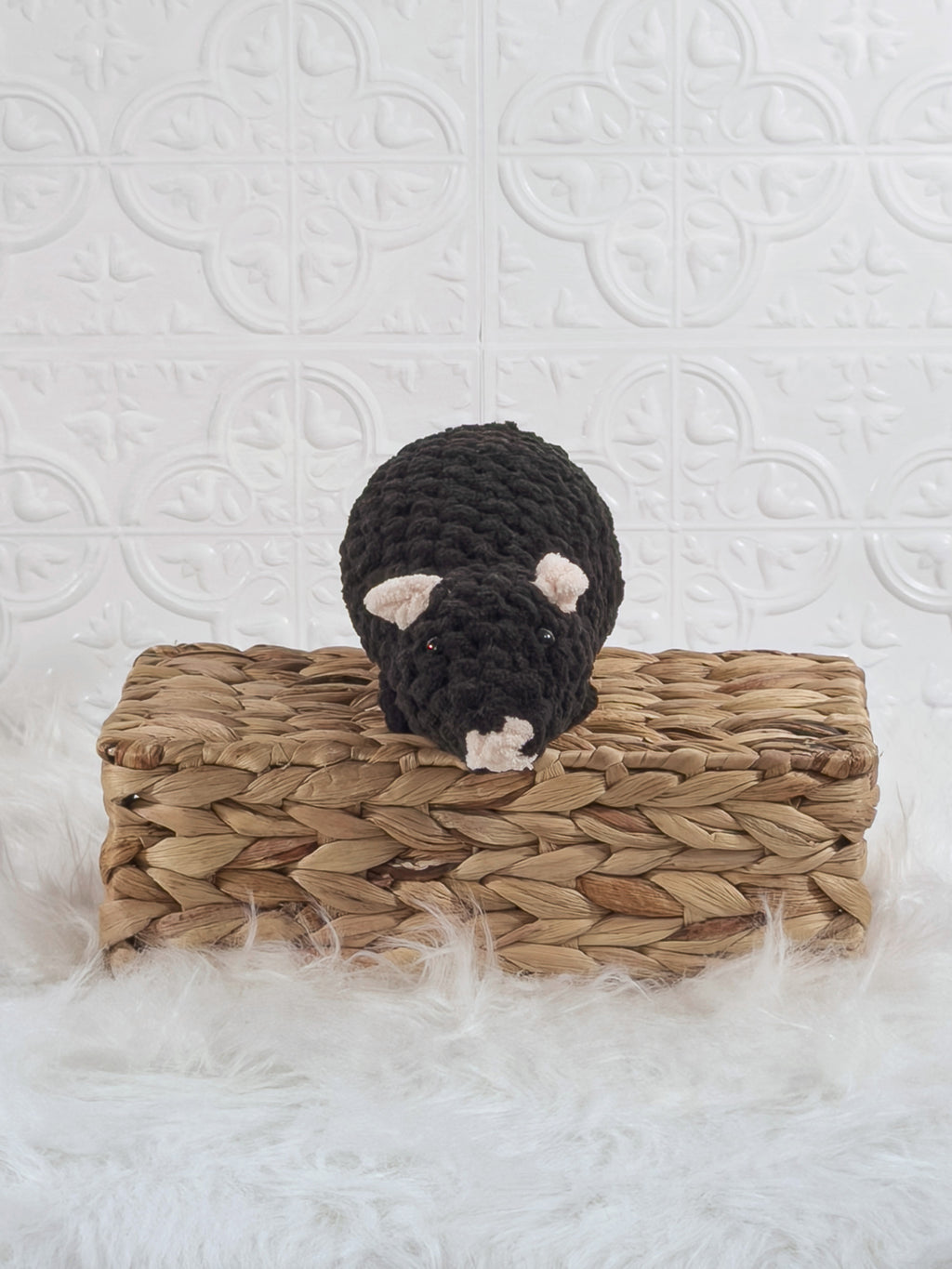 Handmade black rat crochet plushie shown from the front