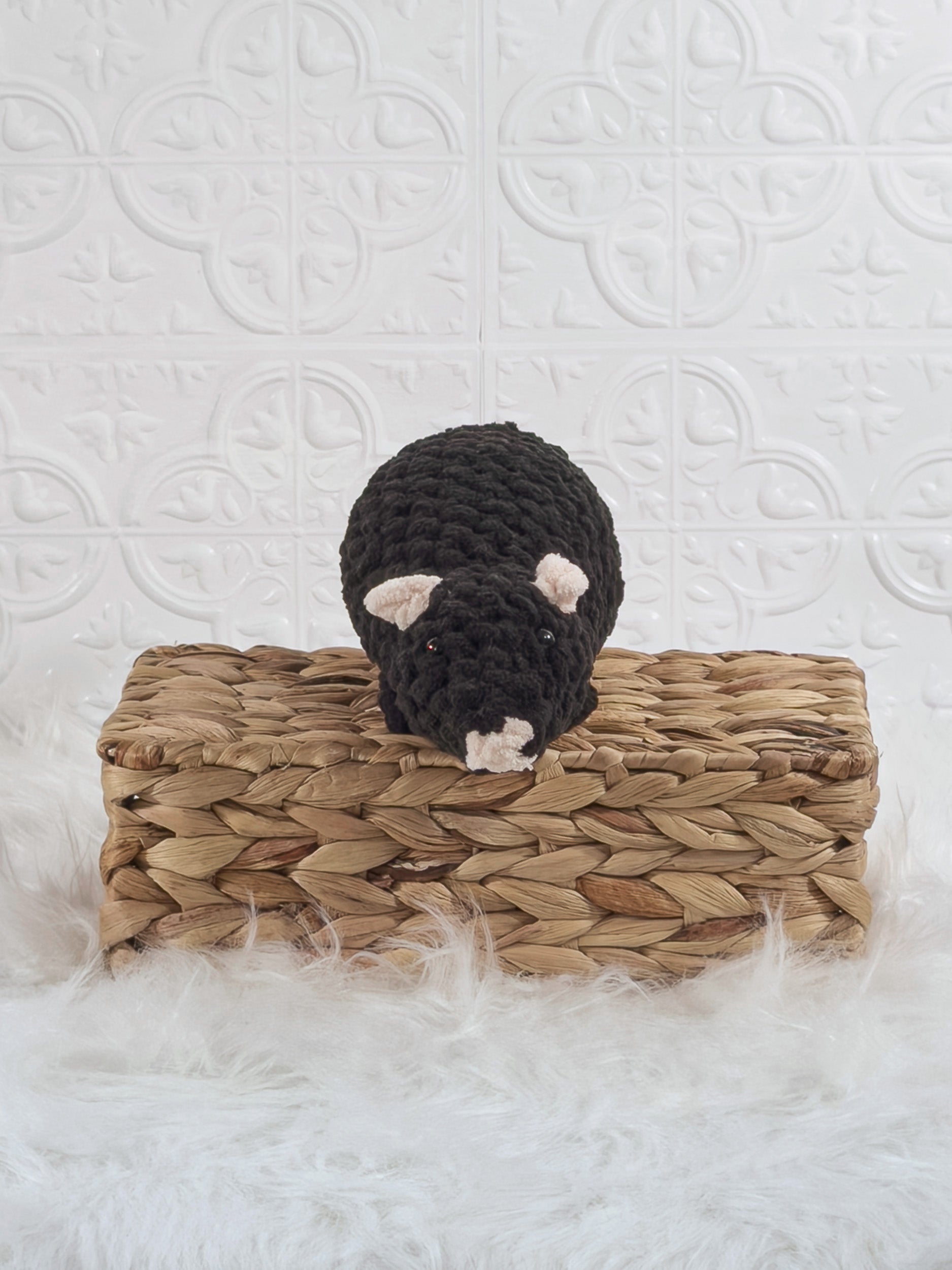 Handmade black rat crochet plushie shown from the front