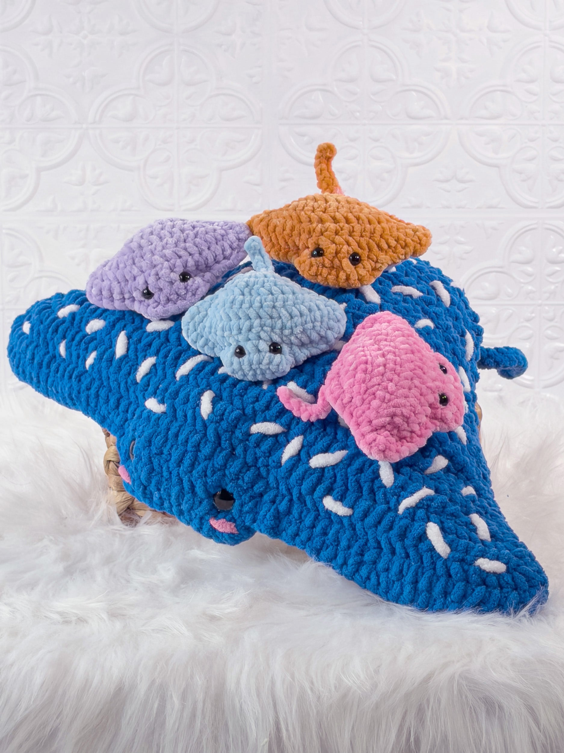 Handmade blue big stingray crochet plushie shown from an angled view