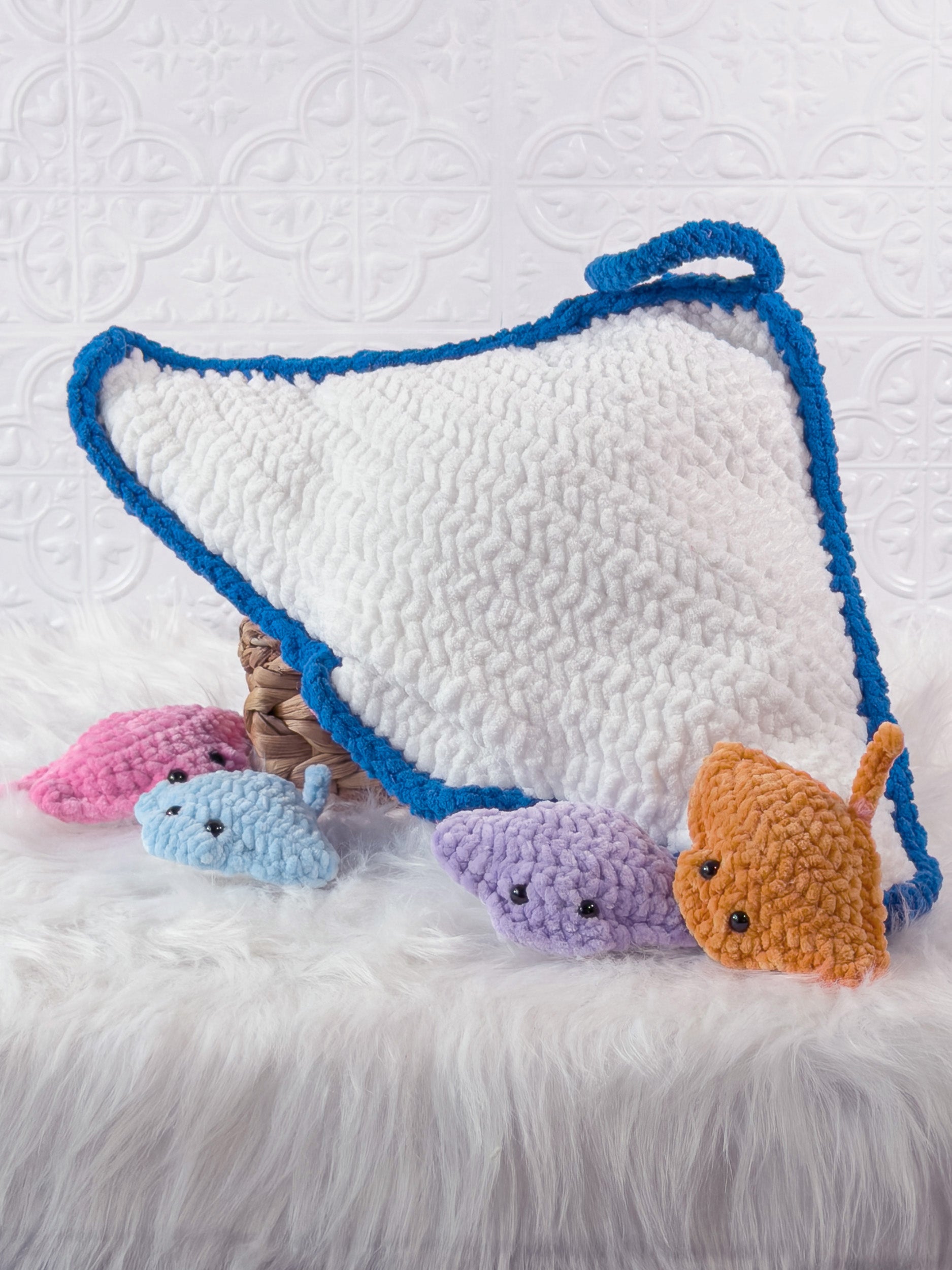 Handmade blue big stingray crochet plushie shown from the back