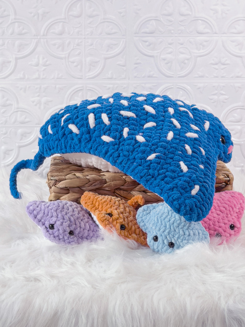 Handmade blue big stingray crochet plushie shown from the side