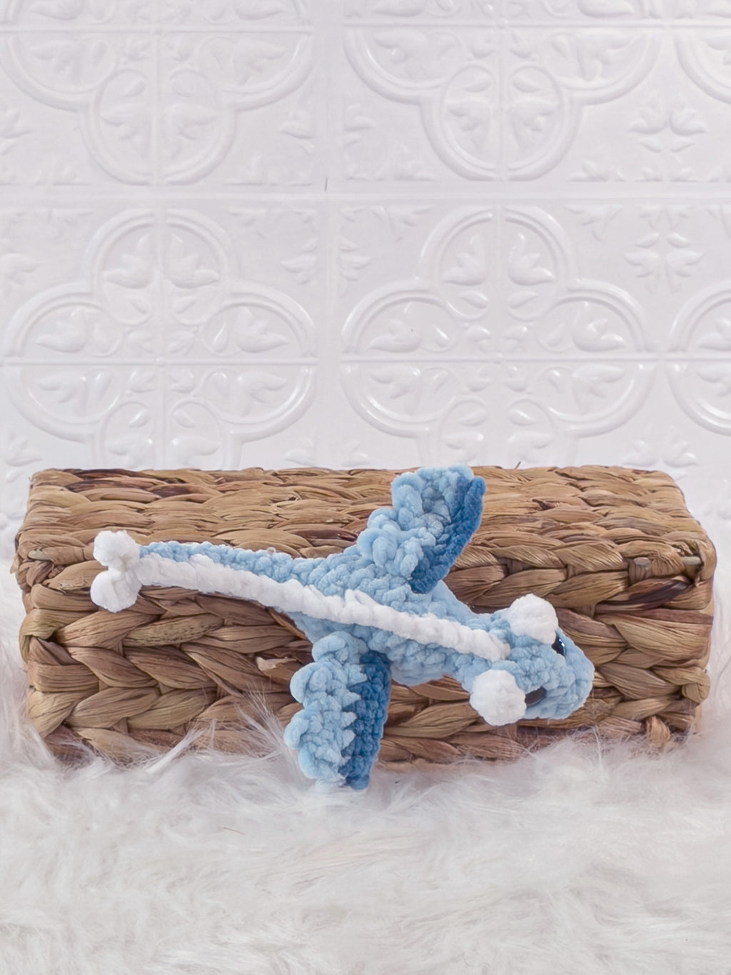 Handmade blue mini dragon crochet plushie shown in a product image