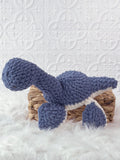 Handmade plesiosaurus crochet plushie shown from the front