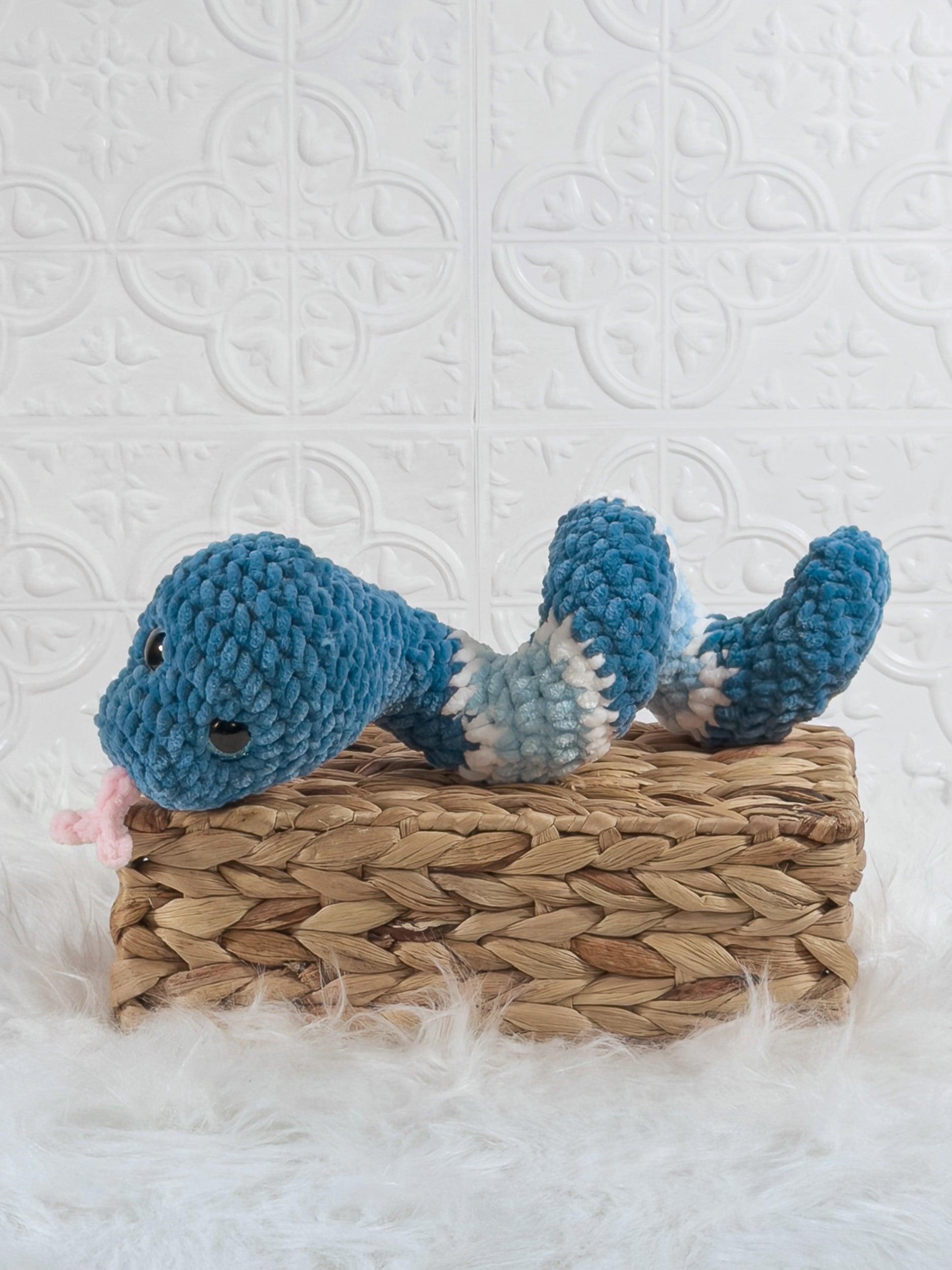 Handmade snake crochet plushie shown from the front