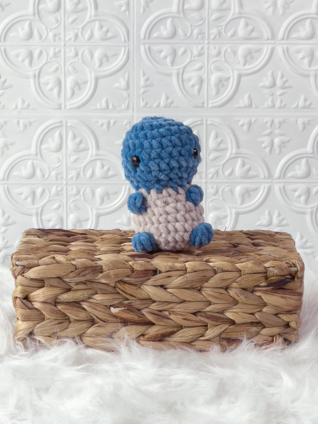 Handmade blue squirtle crochet plushie shown from the front