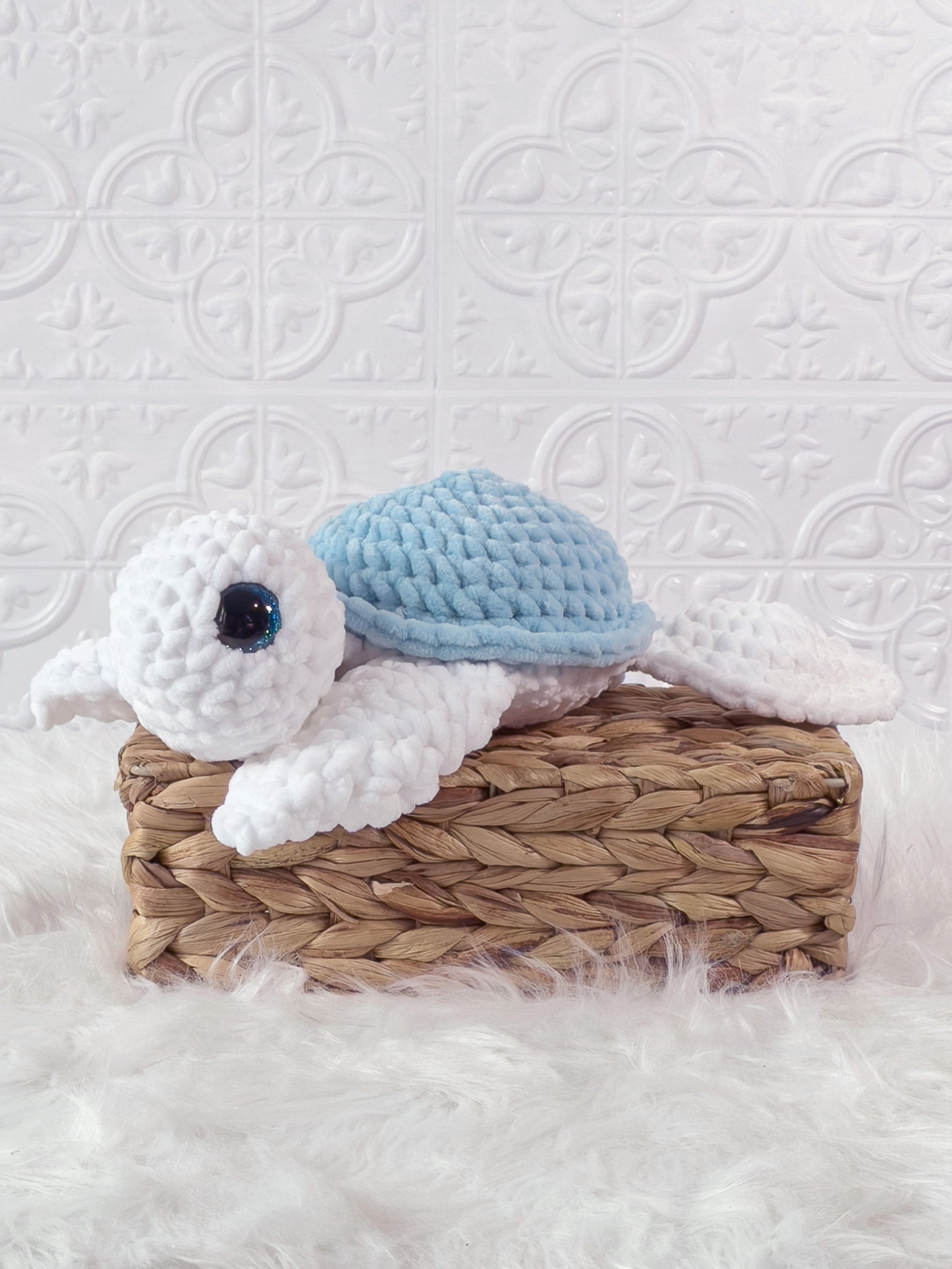 Handmade turtle crochet plushie shown from the front