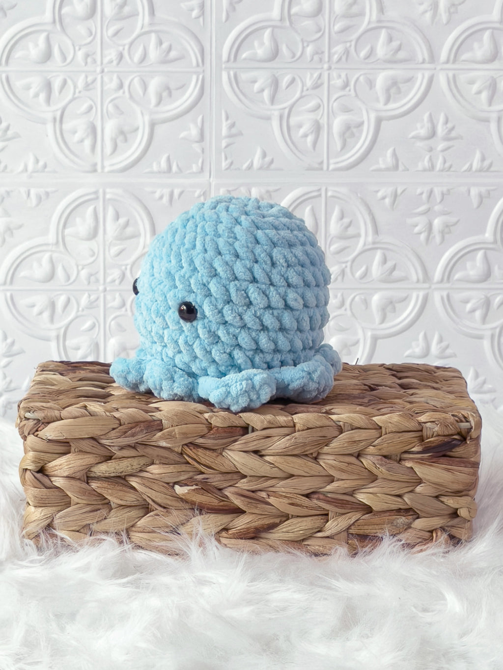 Handmade octopus crochet plushie shown from the front