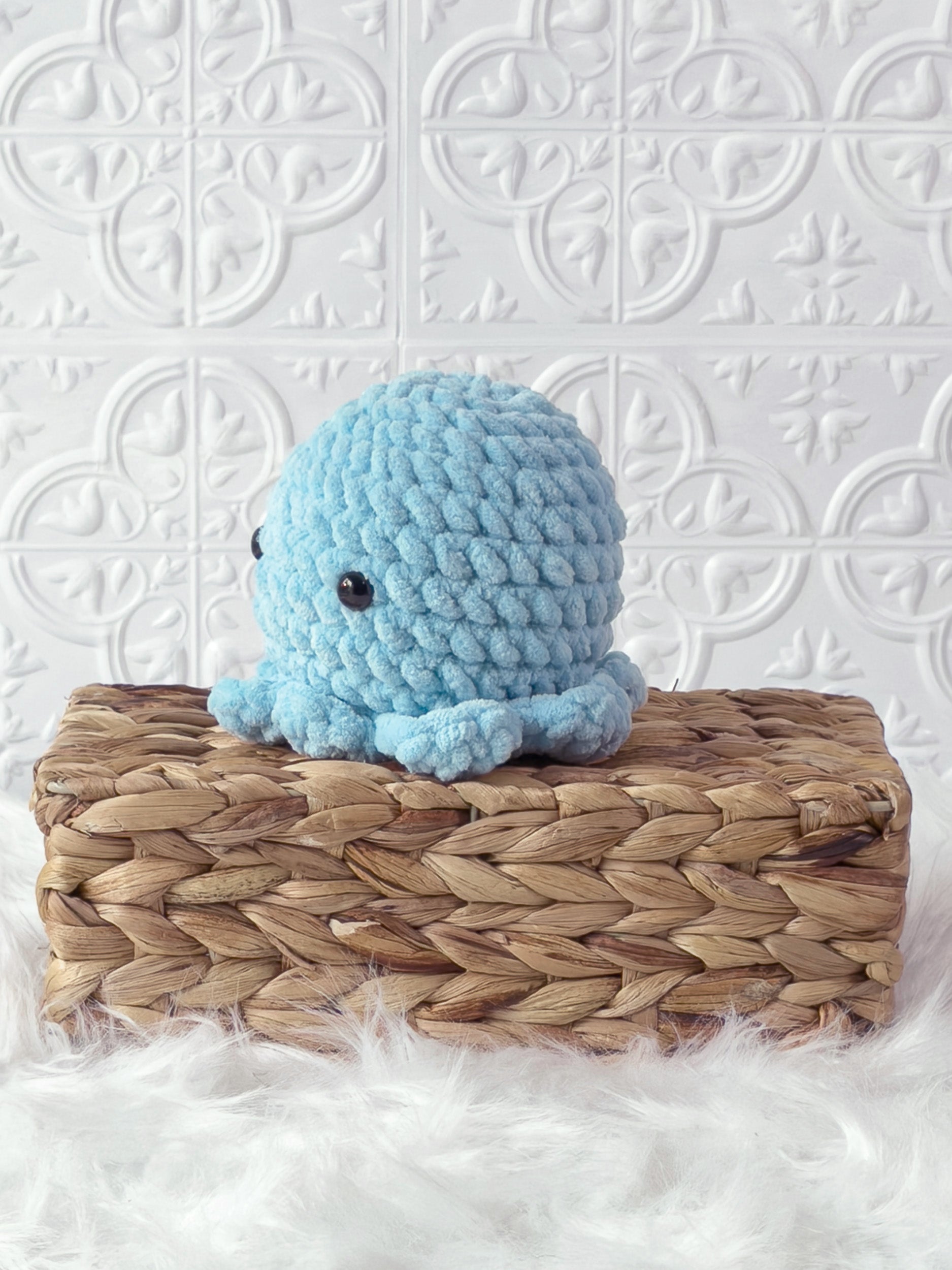 Handmade octopus crochet plushie shown from the front