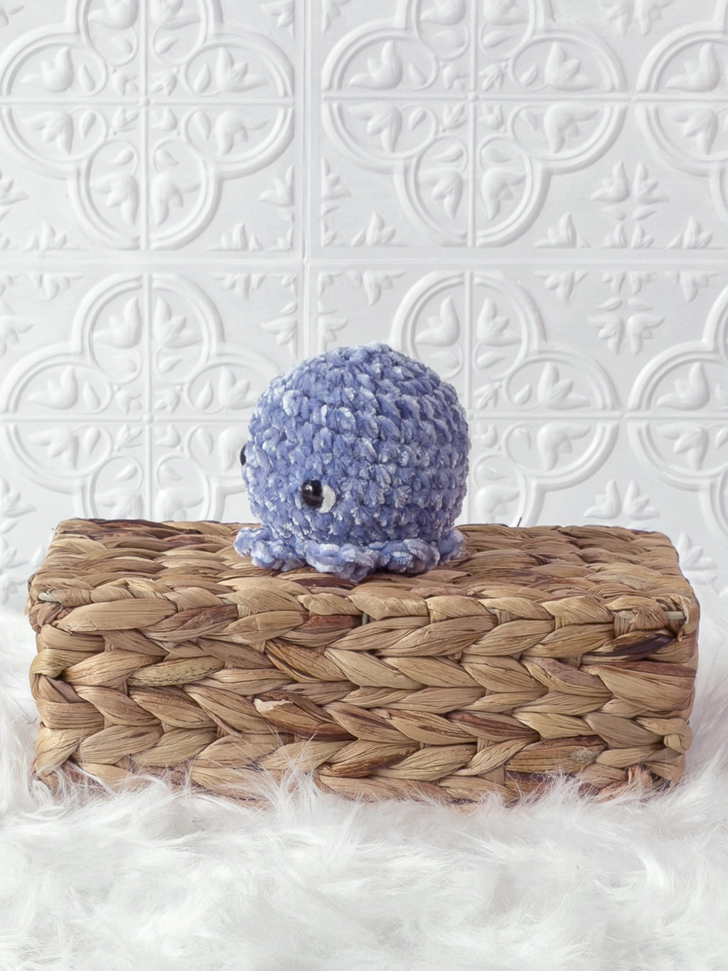 Handmade octopus crochet plushie shown from the front