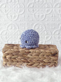 Handmade octopus crochet plushie shown from the front