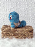 Handmade Squirtle crochet plushie with turtle-inspired character details