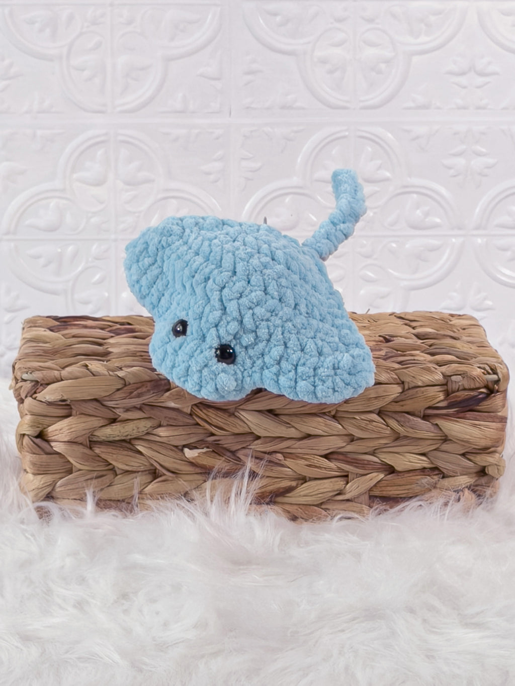 Handmade stingray crochet plushie shown from the front