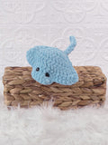 Handmade stingray crochet plushie shown from the front