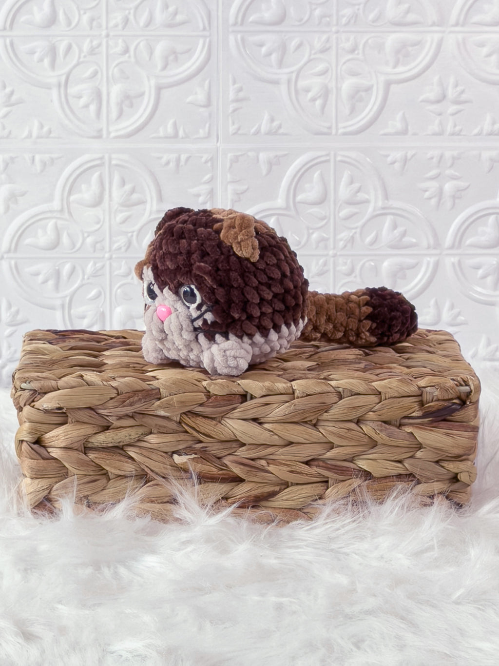 Handmade kitten crochet plushie shown from the front