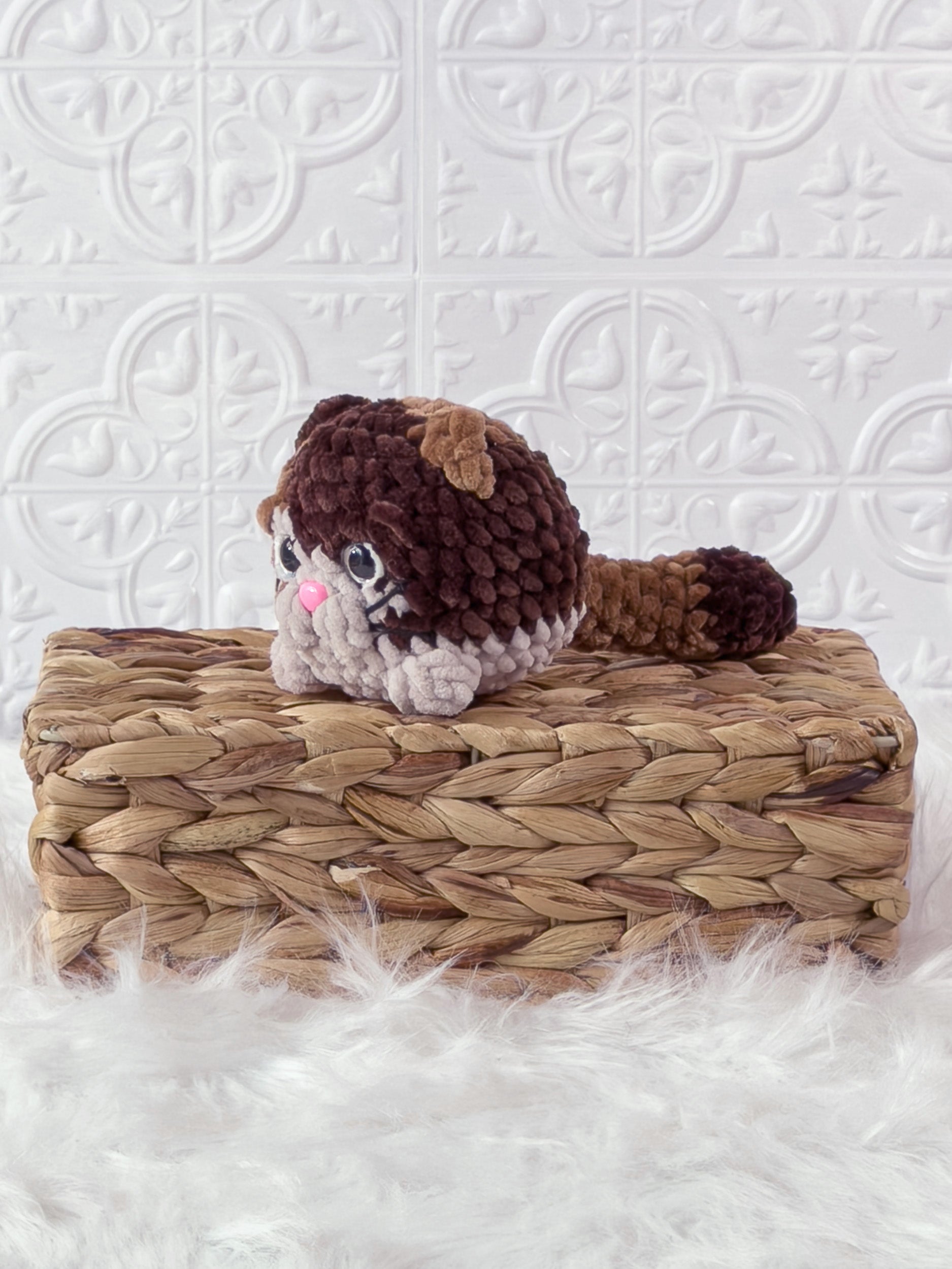 Handmade kitten crochet plushie shown from the front