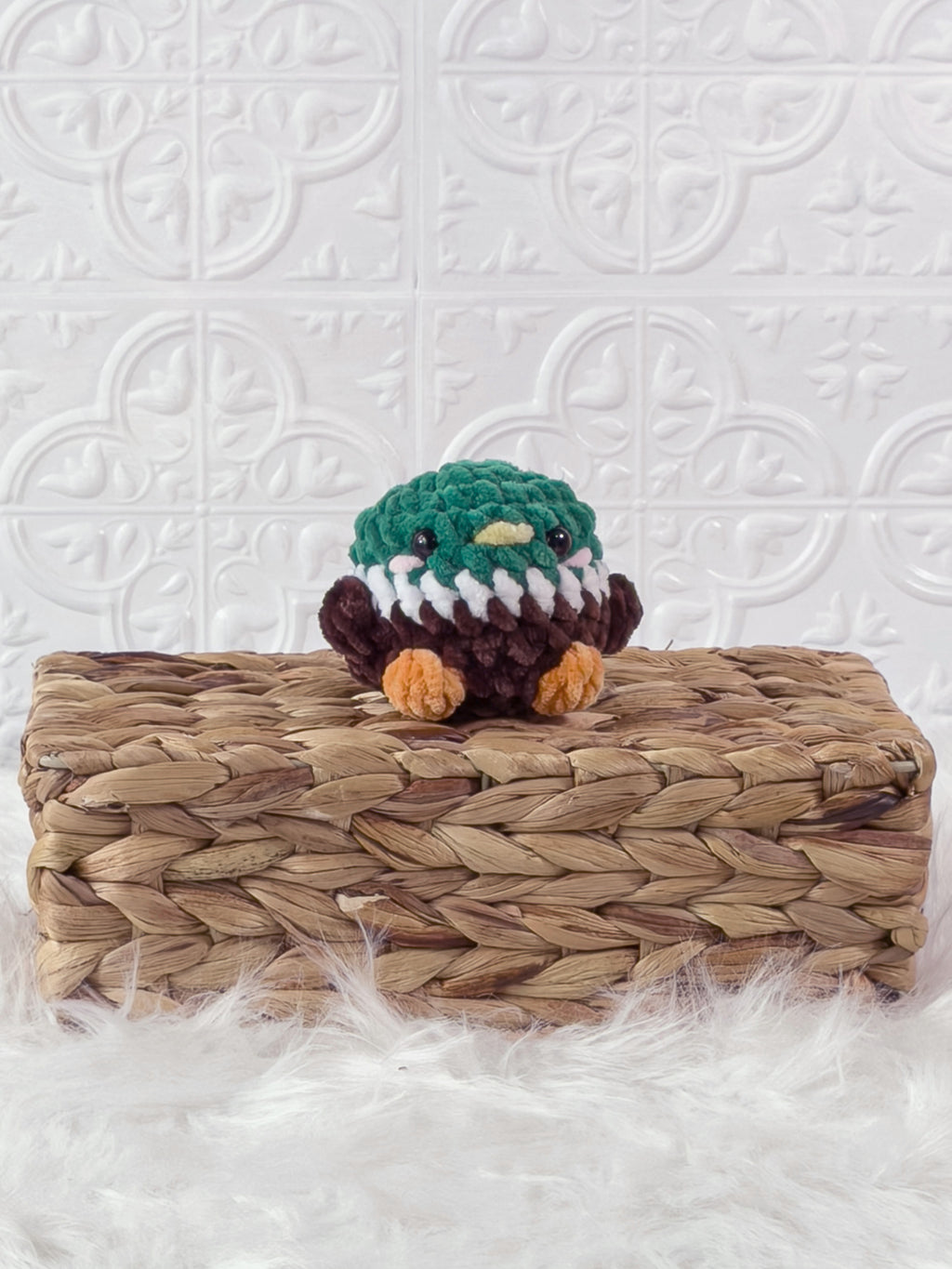 Handmade brown mallard crochet plushie shown from the front