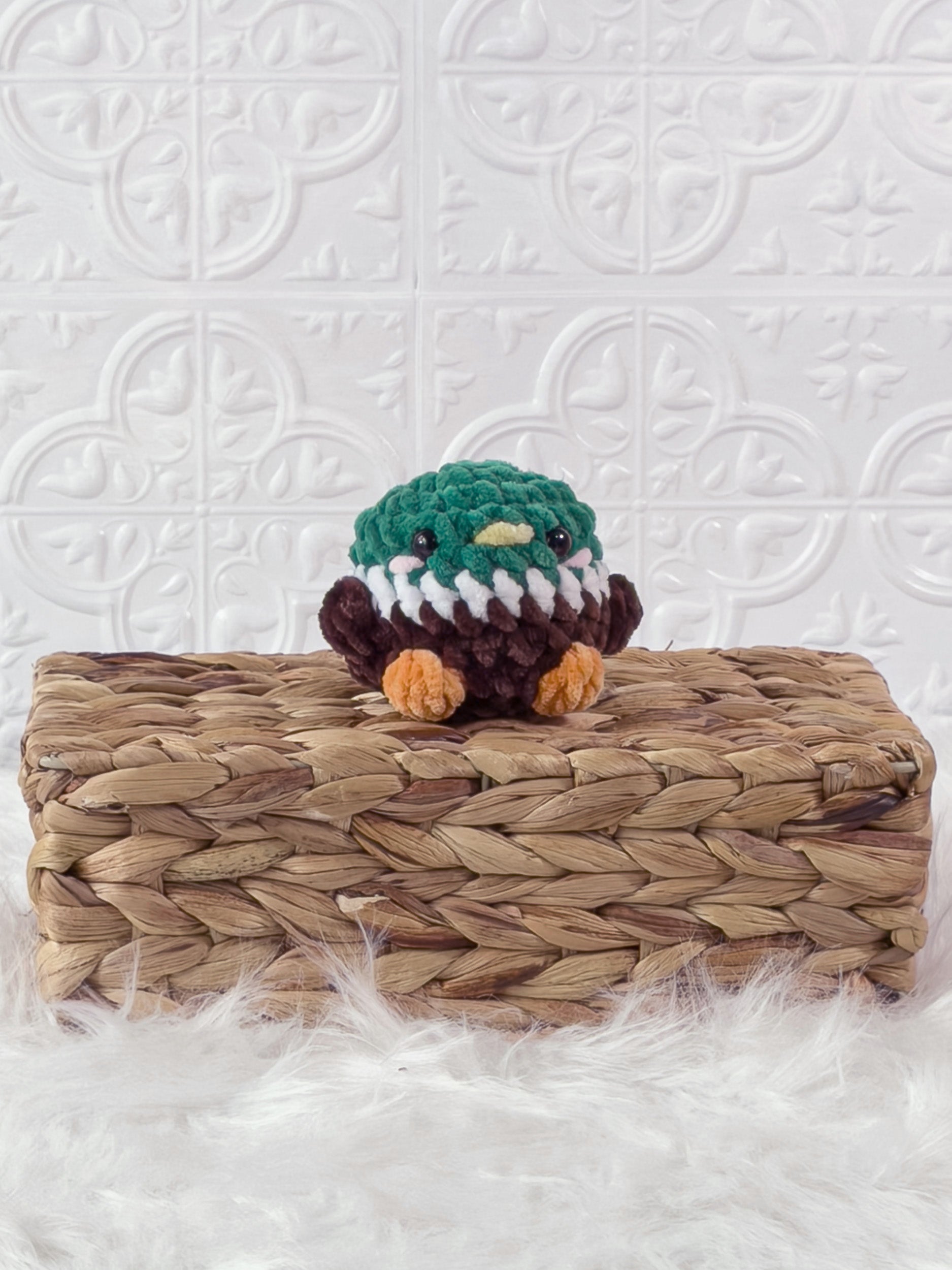 Handmade brown mallard crochet plushie shown from the front
