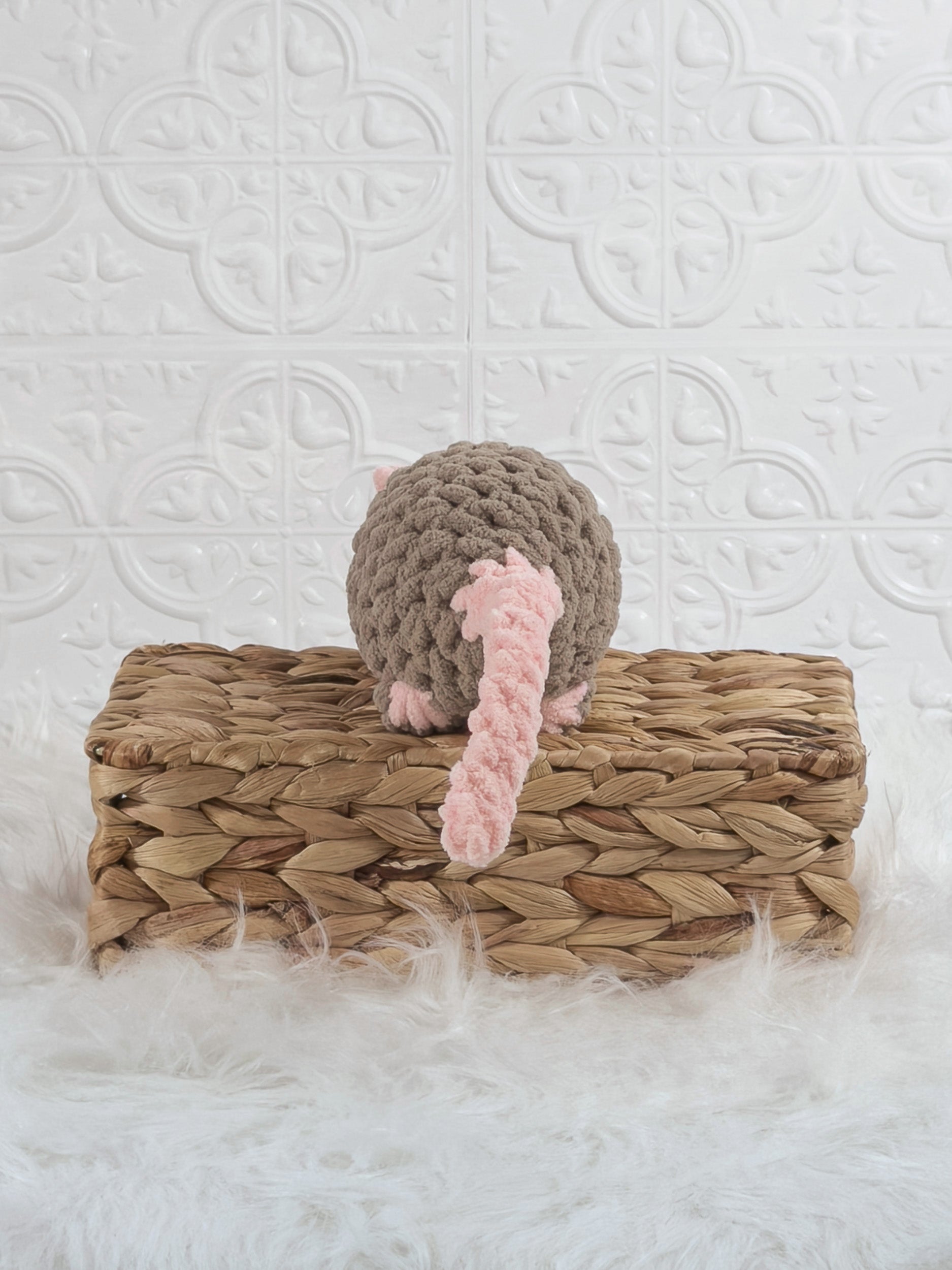 Handmade brown rat crochet plushie shown from the back