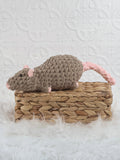 Handmade brown rat crochet plushie with rounded ears and a long soft body