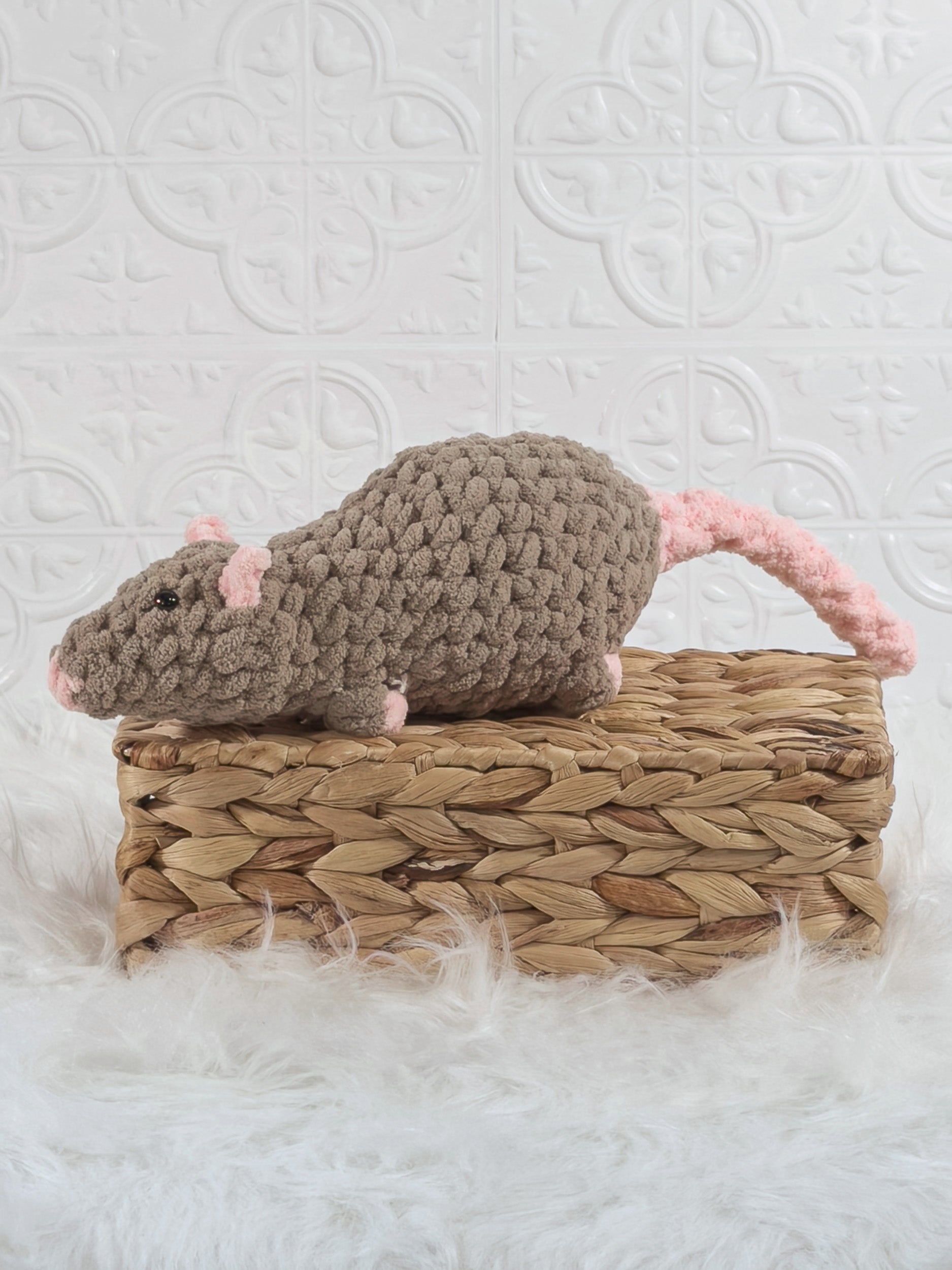 Handmade brown rat crochet plushie with rounded ears and a long soft body