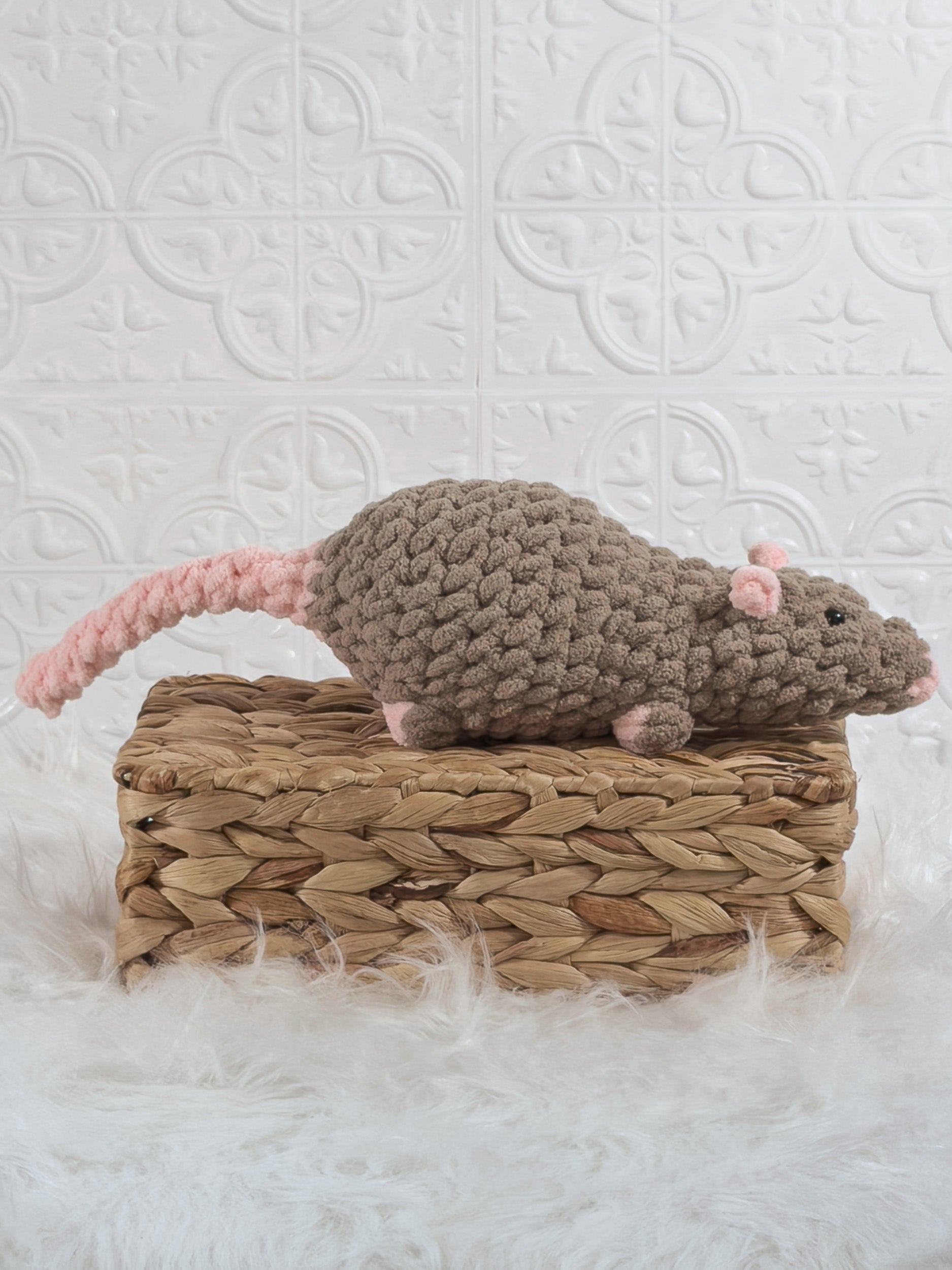 Handmade brown rat crochet plushie shown from the side