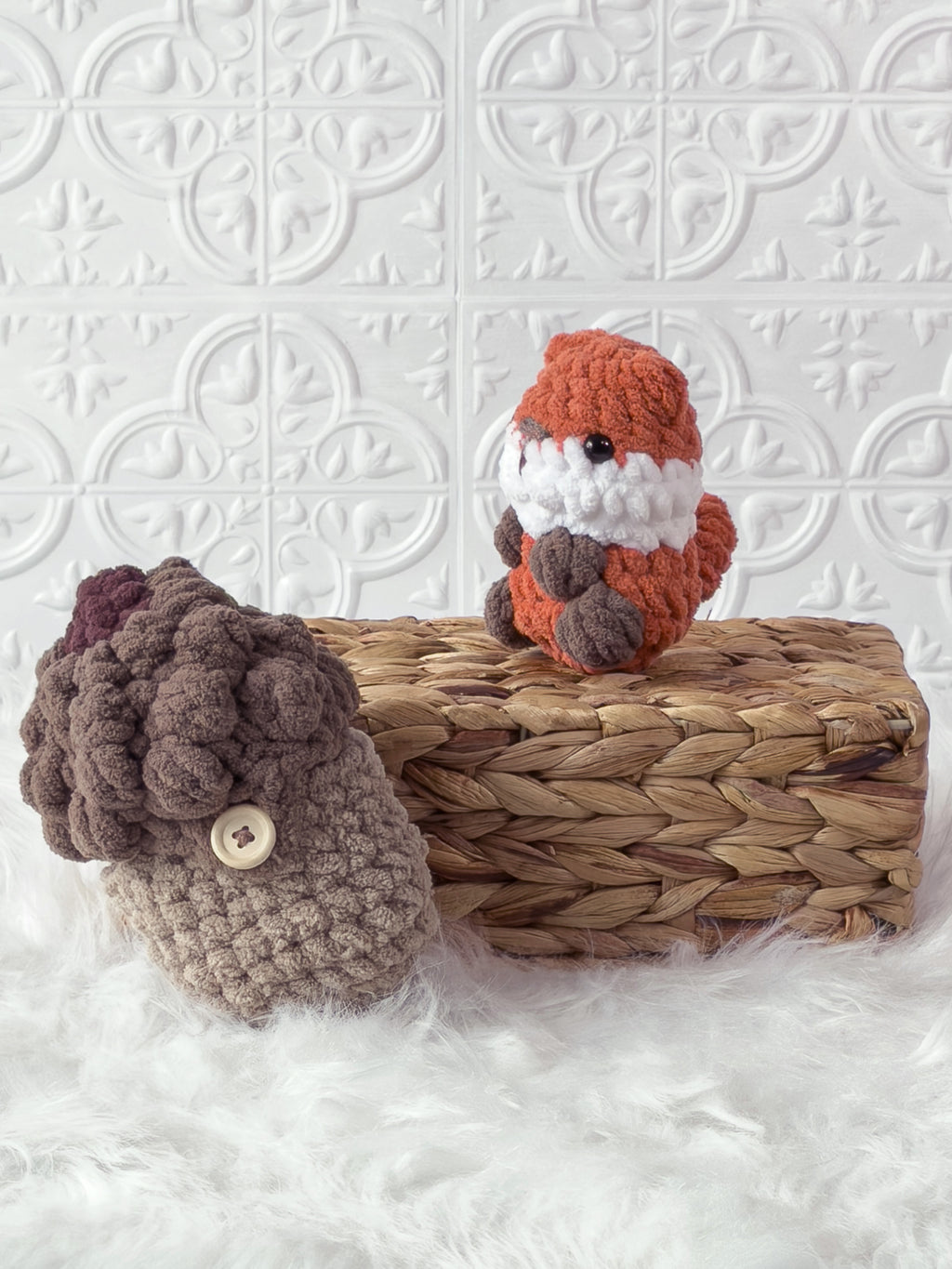 Handmade peek-a-boo fox crochet plushie inside a crochet acorn