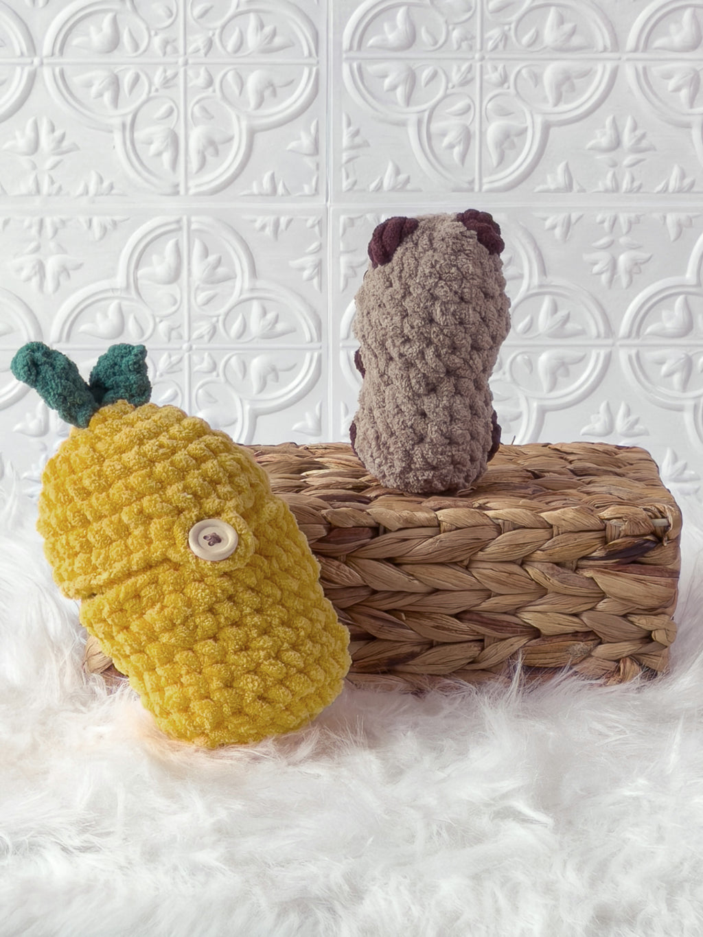 Handmade brown, yellow peek a boo capybara in lemon crochet plushie shown from the back