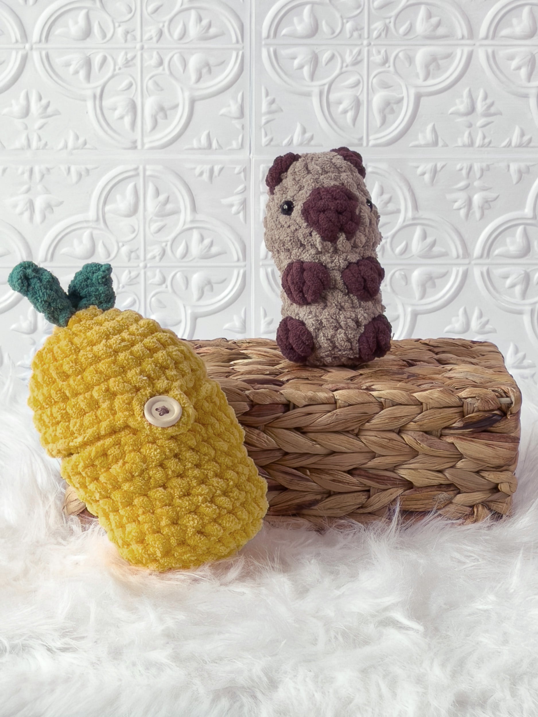 Handmade brown, yellow peek a boo capybara in lemon crochet plushie shown from the front