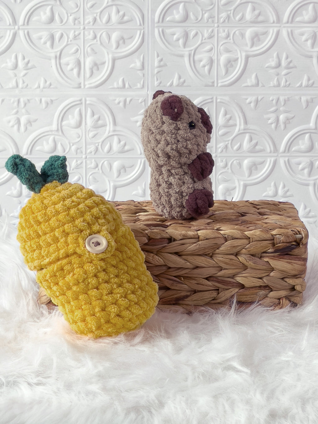 Handmade brown, yellow peek a boo capybara in lemon crochet plushie shown from the side
