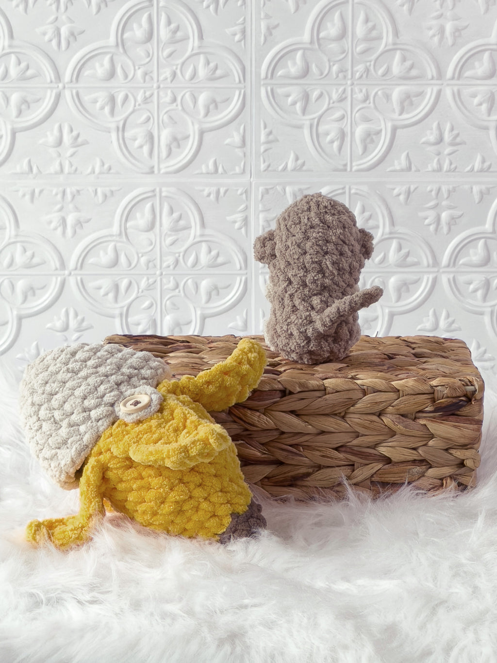 Handmade brown, yellow peek a boo monkey in banana crochet plushie shown from the back
