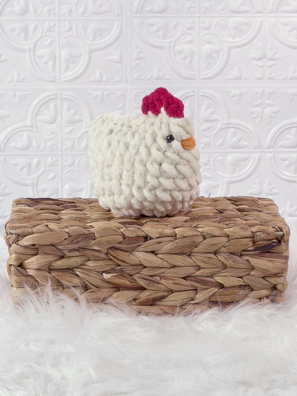 Handmade cream, light chicken crochet plushie shown from an angled view