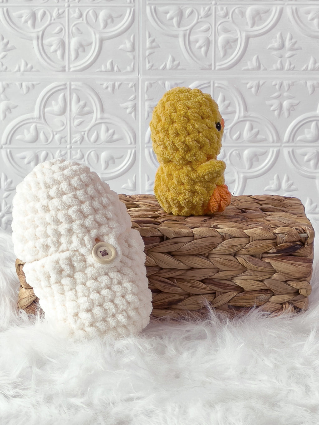 Handmade cream, yellow peek a boo chick in egg crochet plushie shown from the side
