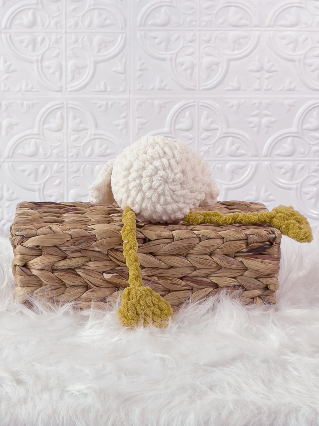 Handmade cream, yellow silly goose crochet plushie shown from the back