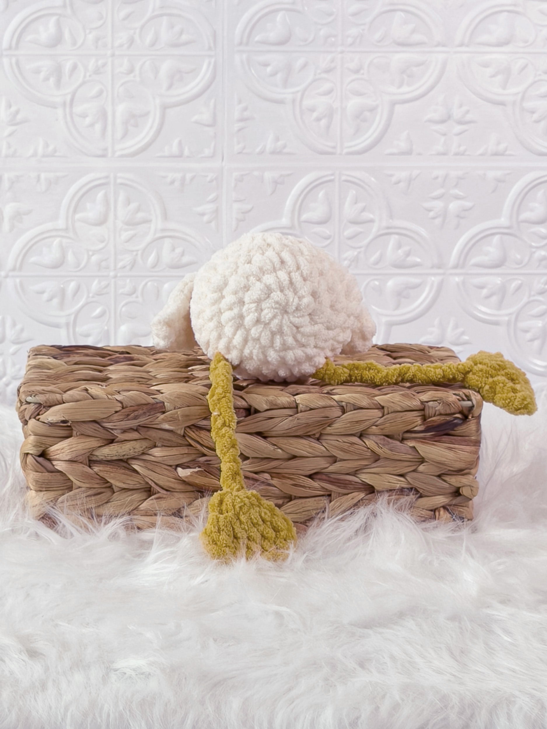 Handmade cream, yellow silly goose crochet plushie shown from the back