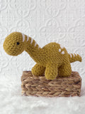 Handmade brachiosaurus crochet plushie shown from the front