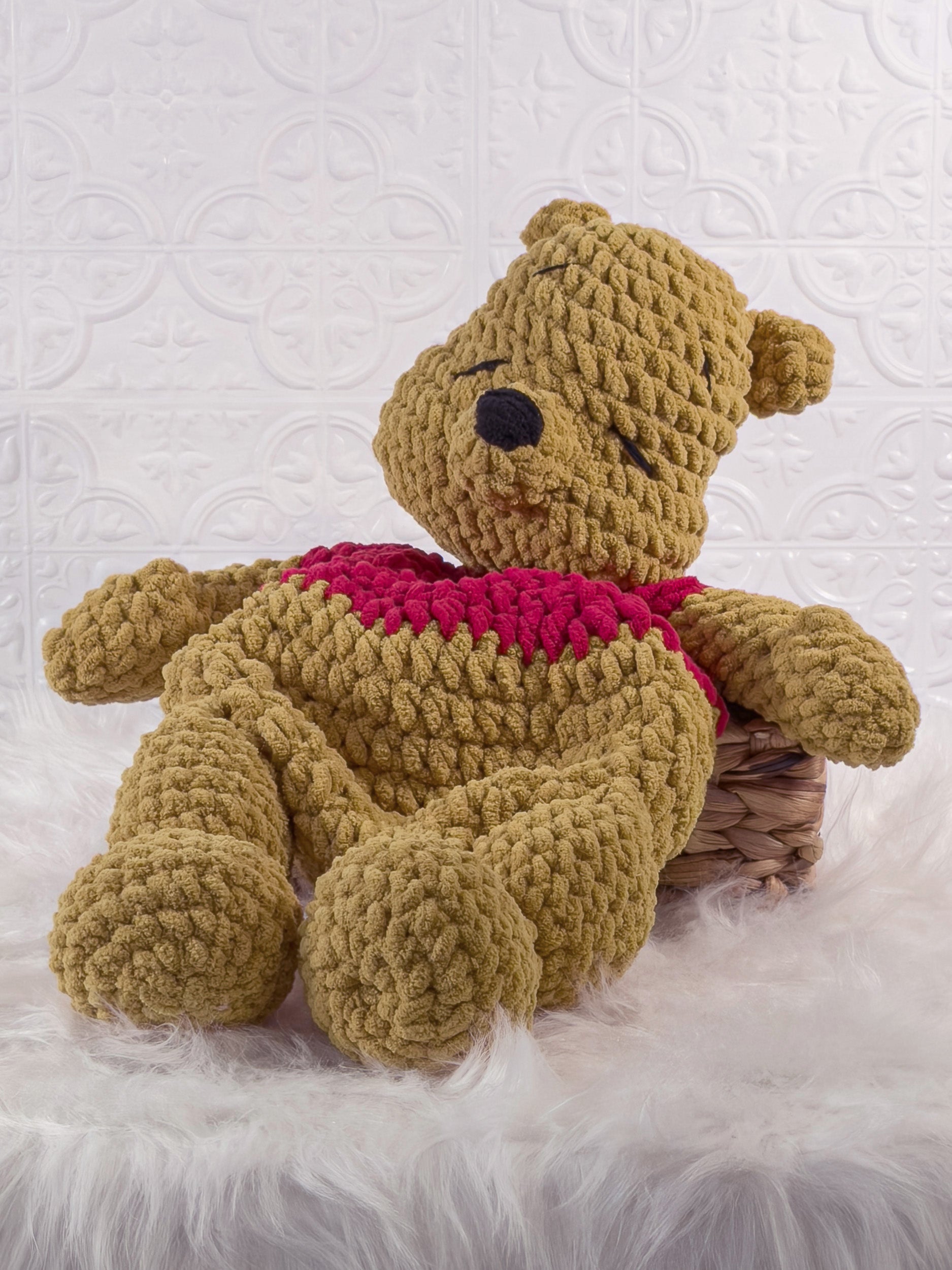 Handmade gold winnie the pooh crochet snuggler shown from the front