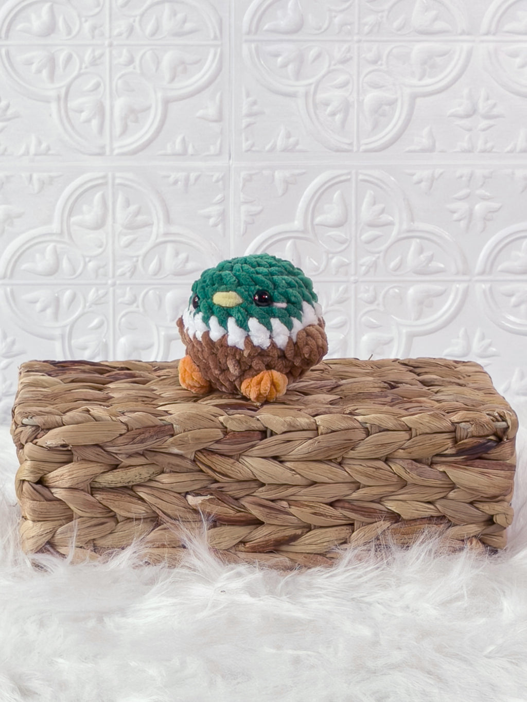 Handmade mallard crochet plushie shown from the front