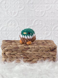 Handmade mallard crochet plushie shown from the front