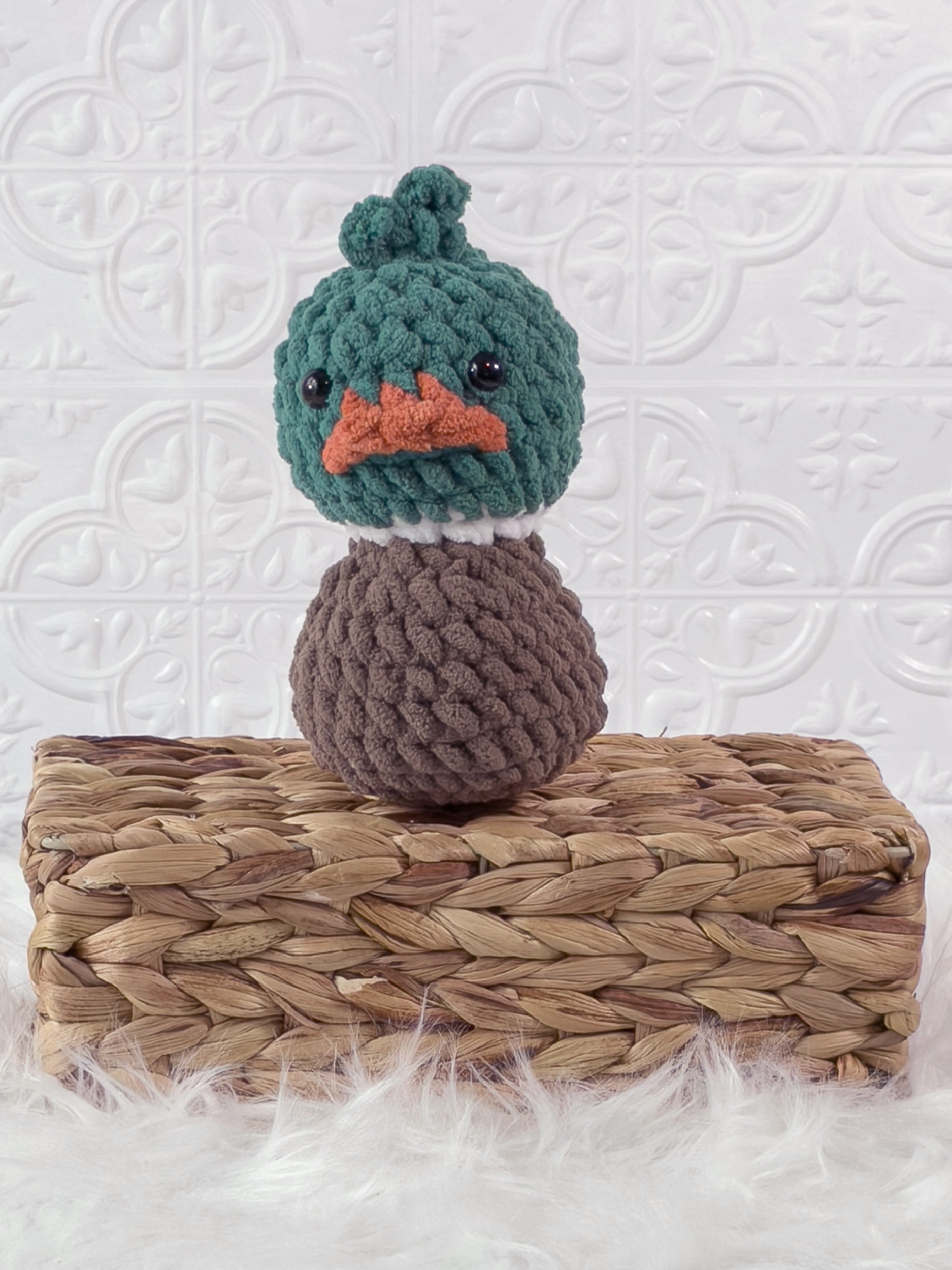 Handmade green mallard rubber duck crochet plushie shown from the front