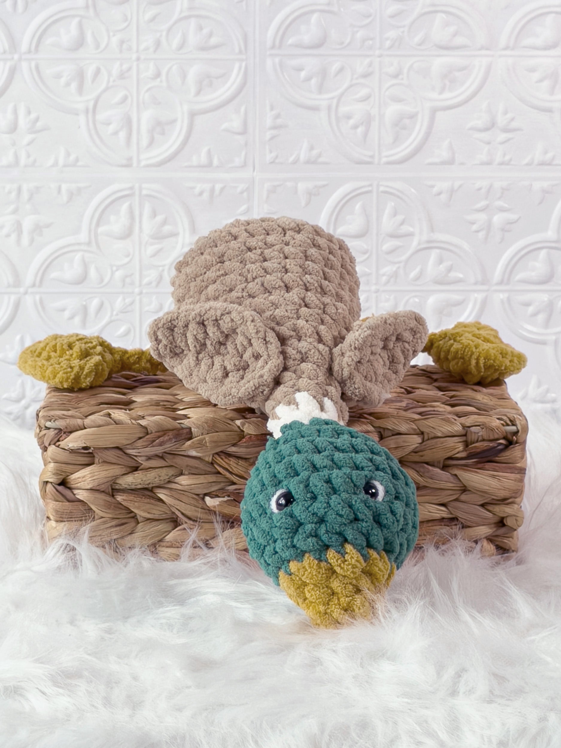 Handmade green silly mallard crochet plushie shown from the front